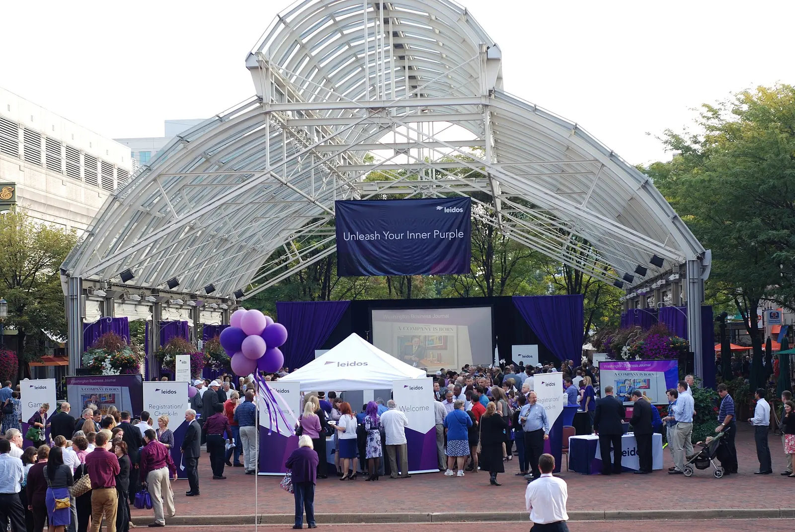 The glass-roofed Pavilion at Reston Town Center, home of the winter ice rink, during an outdoor event